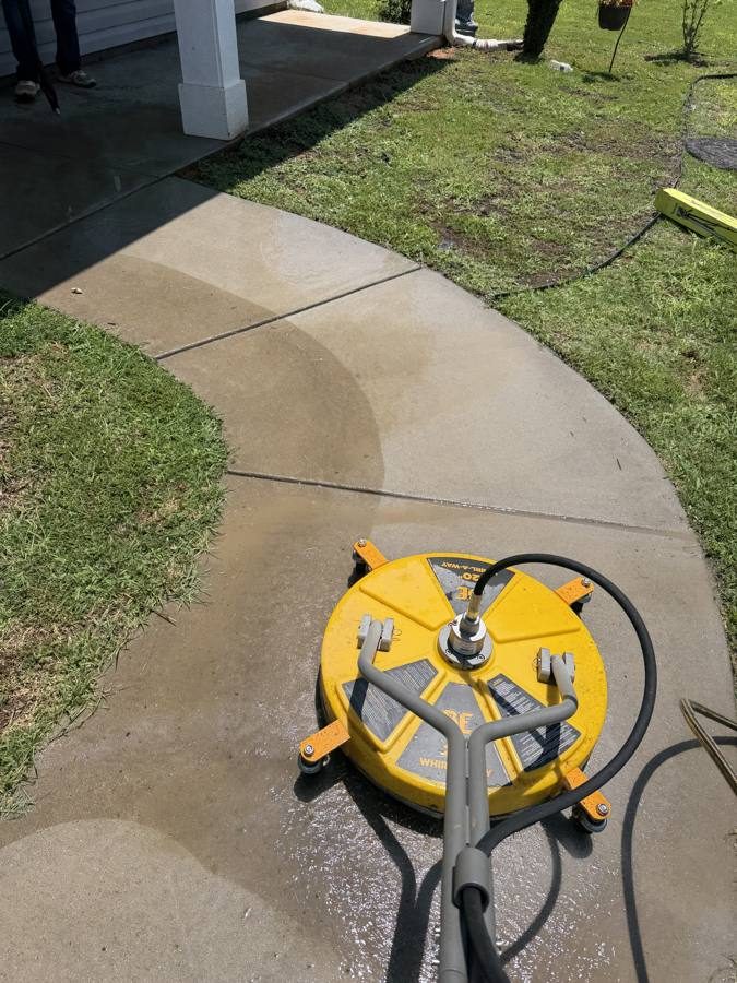 Surface cleaner cleaning a concrete walkway, Greenwood SC